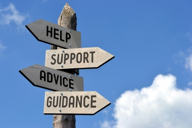 sign post showing directions to help support advice and guidance